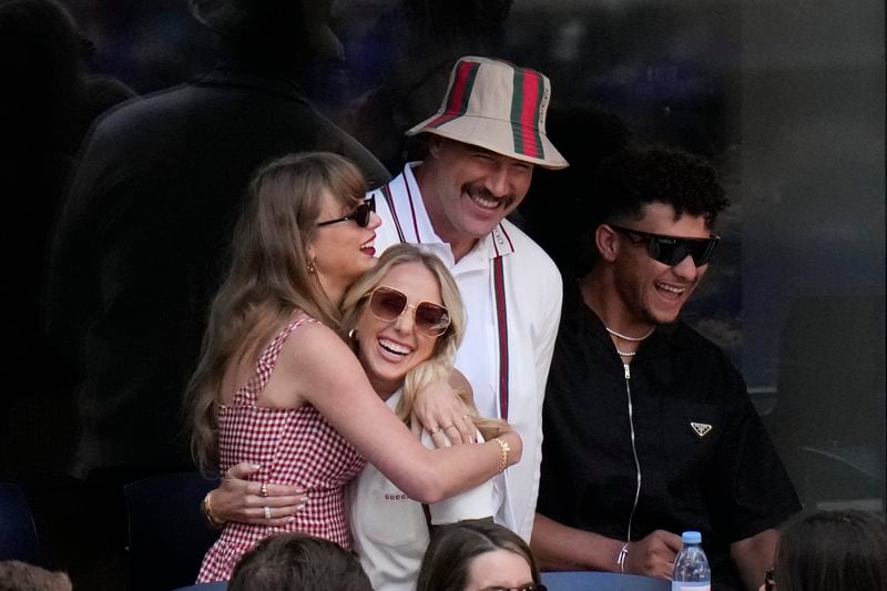 Kansas City Chiefs quarterback Patrick Mahomes, right, and his wife Brittany join Taylor Swift, left, and Chiefs tight end Travis Kelce, to watch play between Jannik Sinner, of Italy, and Taylor Fritz, of the United States, during the men's singles final of the U.S. Open tennis championships, Sunday, Sept. 8, 2024, in New York. (AP Photo/Frank Franklin II)