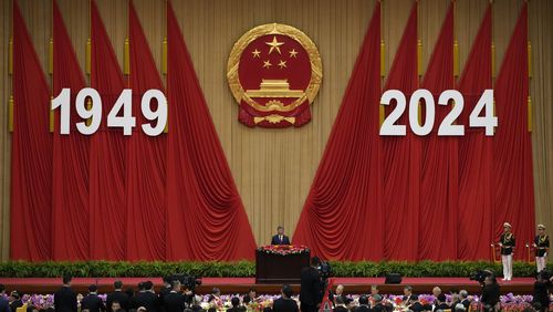 FILE- Chinese President Xi Jinping delivers his speech at a dinner marking the 75th anniversary of the founding of the People's Republic of China, at the Great Hall of the People in Beijing, Sept. 30, 2024. (AP Photo/Andy Wong, File)