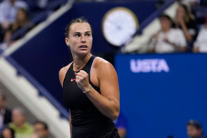 Aryna Sabalenka, of Belarus, reacts after winning the first set against Emma Navarro, of the United States, during the women's singles semifinals of the U.S. Open tennis championships, Thursday, Sept. 5, 2024, in New York. (AP Photo/Seth Wenig)