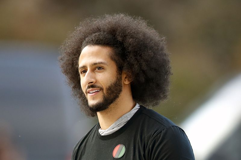 FILE - Free agent quarterback Colin Kaepernick arrives for a workout for NFL football scouts and media in Riverdale, Ga., Nov. 16, 2019. (AP Photo/Todd Kirkland, File)