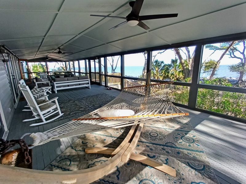 The 820-square-foot screened-in porch of the Turner House has an ocean view and is a prime gathering spot for families staying in Ted Turner's former vacation home.
(Courtesy of Blake Guthrie)