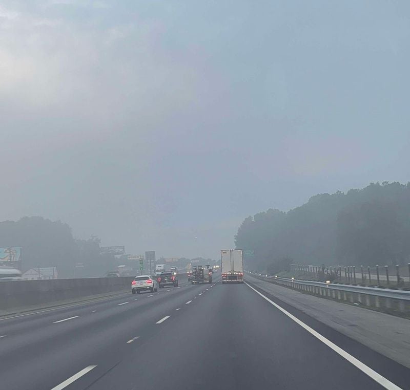 Lisa Bishop's view of the plume from her car in Conyers on Friday. Her son went to the ER due to chest pain this week.