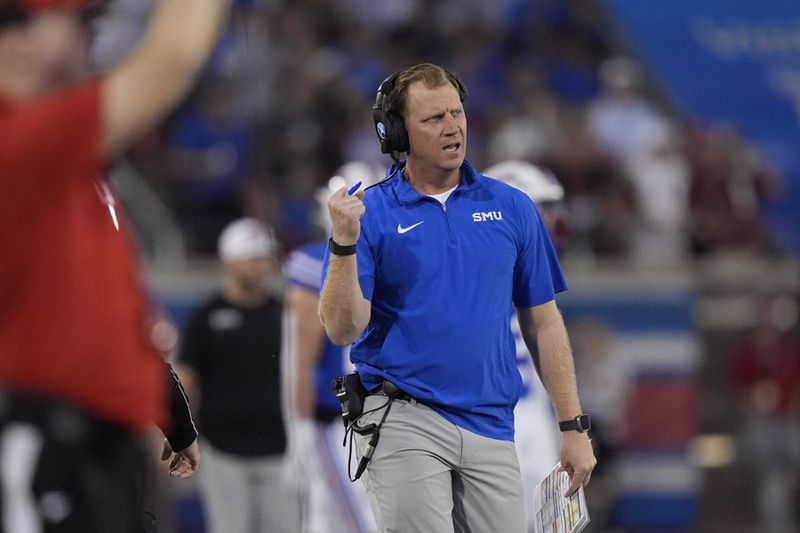 SMU head coach Rhett Lashlee reacts after a play during the first half of an NCAA college football game against Florida State, Saturday, Sept. 28, 2024, in Dallas. (AP Photo/LM Otero)