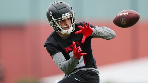 Atlanta Falcons wide receiver Drake London (5) makes a catch during minicamp at the Atlanta Falcons Training Camp, Tuesday, May 14, 2024, in Flowery Branch, Ga. (Jason Getz / AJC)
