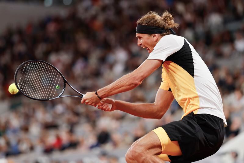 Germany's Alexander Zverev plays a shot against Spain's Rafael Nadal during their first round match of the French Open tennis tournament at the Roland Garros stadium in Paris, Monday, May 27, 2024. (AP Photo/Jean-Francois Badias)