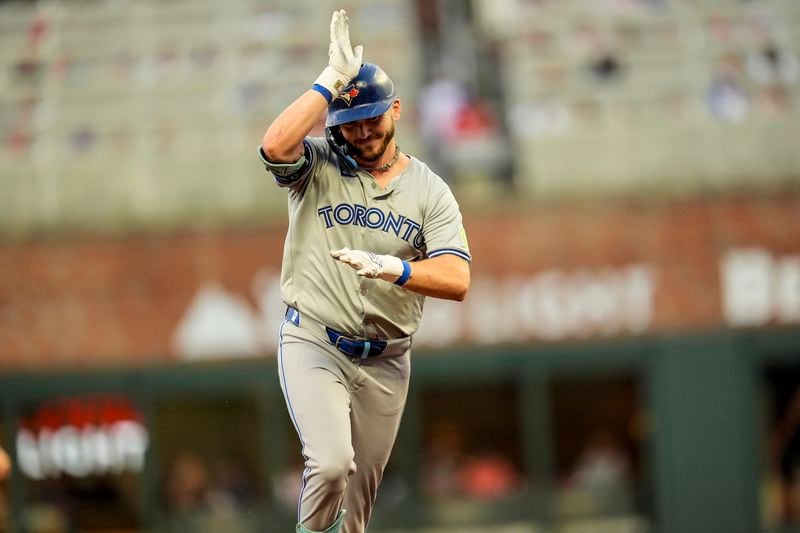 Toronto Blue Jays' Spencer Horwitz (48) celebrates his solo homer against the Atlanta Braves in the first inning of a baseball game, Saturday, Sept. 7, 2024, in Atlanta.(AP Photo/Mike Stewart)