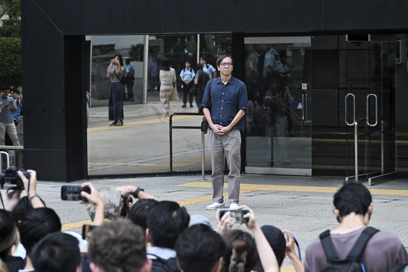 Chung Pui-kuen, the former chief editor of Hong Kong's now-shuttered outlet Stand News, walks outside on bail after he was found guilty in a landmark sedition trial under a colonial-era law, in Wanchai District Court in Hong Kong on Thursday, Aug. 29, 2024. (AP Photo/Billy H.C. Kwok)