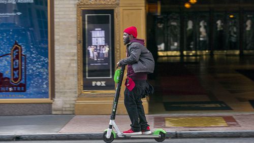 Electric bikes and scooters have been popping up on metro Atlanta roads and sidewalks since last spring. Lawmakers are considering statewide regulations. (ALYSSA POINTER/ALYSSA.POINTER@AJC.COM)