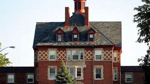 FILE - This July 30, 2018 file photo shows the Dorothea Dix Psychiatric Center, formerly known as Bangor Mental Health Institute in Bangor, Maine. A Florida-based health care company that could receive a $60.3 million state contract to run a 21-bed Maine residence for some psychiatric patients is fighting to keep its proposal secret. (AP Photo/Robert F. Bukaty, File)