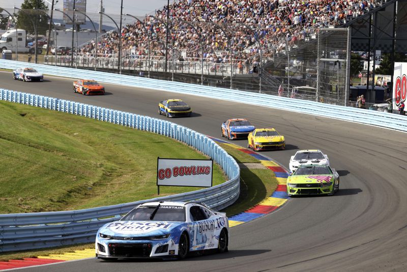 Ross Chasten (1) competes during a NASCAR Cup Series auto race, Sunday, Sept. 15, 2024, in Watkins Glen, N.Y. (AP Photo/Lauren Petracca)