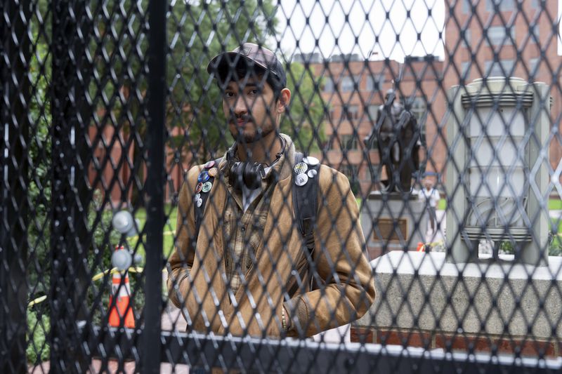 George Washington University student Ty Lindia poses for a photograph at the site of last spring's students tent encampment at George Washington University Yard in Washington, Wednesday, Oct. 2, 2024. (AP Photo/Jose Luis Magana)