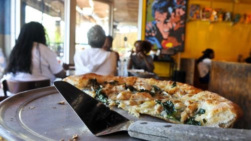 Savage Pizza opened its Little Five Points location in 1990. The restaurant also has a location in Avondale Estates. / AJC file photo