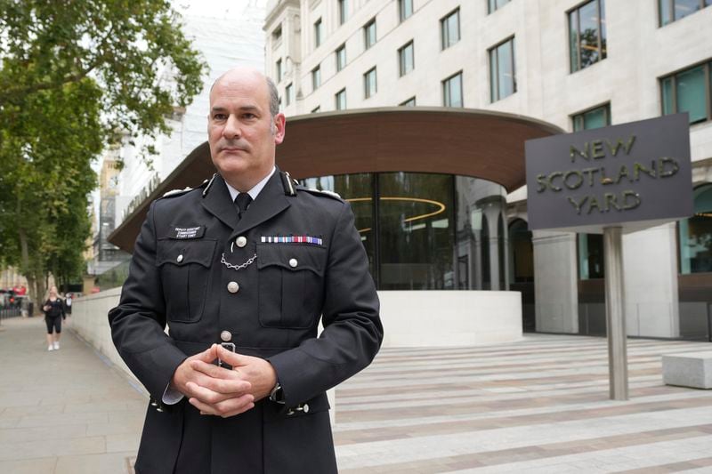 Deputy Assistant Commissioner of the Metropolitan Police, Stuart Cindy, speaks to the media about the Grenfell Tower Fire Inquiry report outside New Scotland Yard in London, Wednesday, Sept. 4, 2024. The report on the Grenfell Tower fire in which 72 people were killed in June 2017, says decades of failure by government and industry made the high-rise a "death trap". (AP Photo/Kin Cheung)