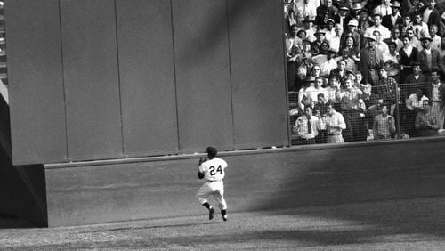 FILE - New York Giants' Willie Mays makes a catch of a ball hit by Cleveland Indians' Vic Wertz in Game 1 of the 1954 baseball World Series in New York's Polo Grounds on Sept. 29, 1954. Mays, the electrifying “Say Hey Kid” whose singular combination of talent, drive and exuberance made him one of baseball’s greatest and most beloved players, has died. He was 93. Mays' family and the San Francisco Giants jointly announced Tuesday night, June 18, 2024, he had “passed away peacefully” Tuesday afternoon surrounded by loved ones. (AP Photo, File)