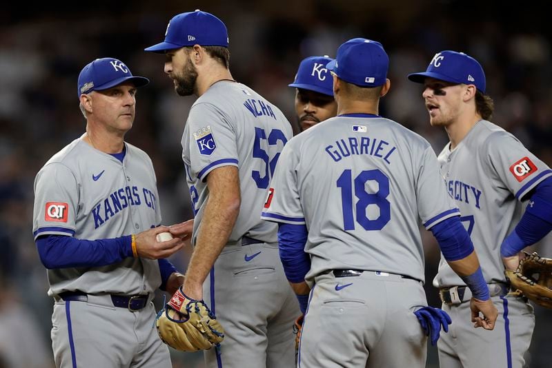 Kansas City Royals pitcher Michael Wacha (52) is relieved by Kansas City Royals manager Matt Quatraro (33) during the fifth inning of Game 1 of the American League baseball division series against the New York Yankees, Saturday, Oct. 5, 2024, in New York.