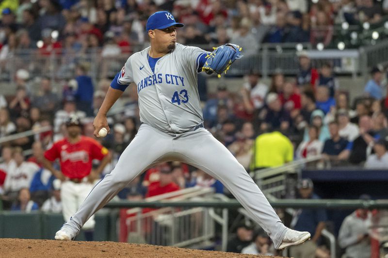 Kansas City Royals pitcher Carlos Hernández throws in the eighth inning of a baseball game against the Atlanta Braves, Friday, Sept. 27, 2024, in Atlanta. (AP Photo/Jason Allen)