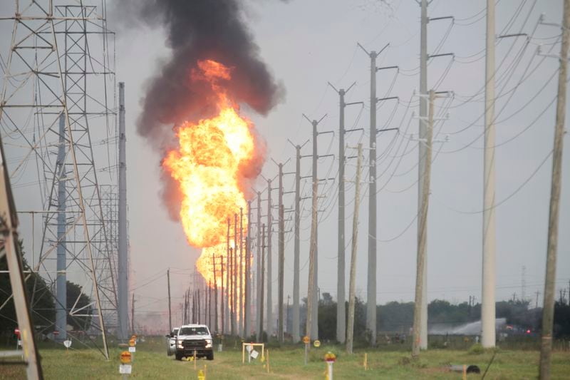 A pipeline carrying natural gas liquids burns near La Porte, Texas, on Monday, Sept. 16, 2024. (AP Photo/Lekan Oyekanmi)