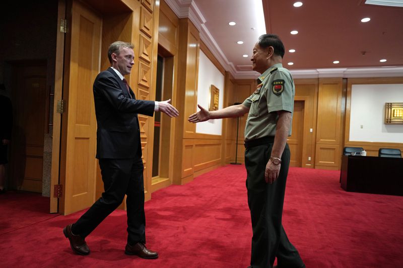 Zhang Youxia, vice chairman of the CPC Central Military Commission, right, shakes hands with White House national security adviser Jake Sullivan before a meeting at the Bayi building in Beijing, Thursday, Aug. 29, 2024. (AP Photo/Ng Han Guan, Pool)