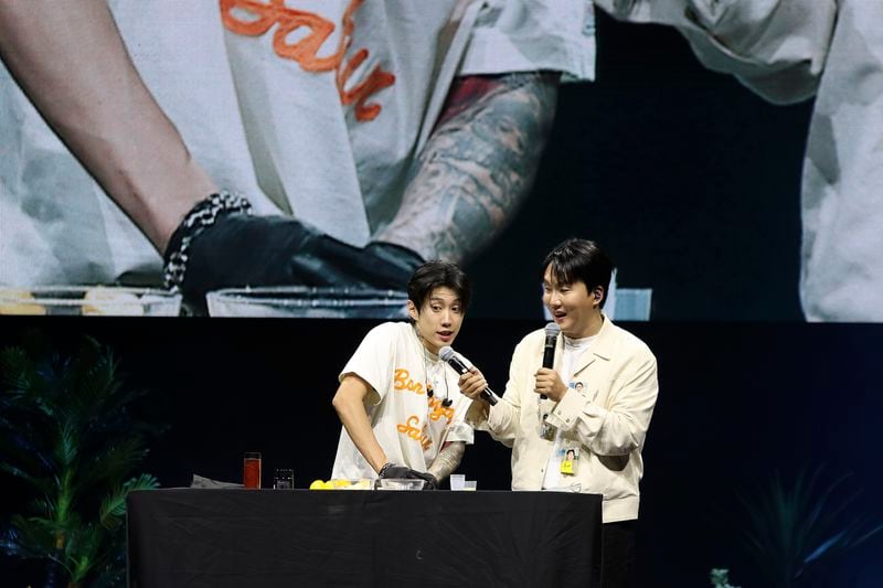 Korean American star Jay Park makes his viral garlic health shots on stage during a fan meeting at Myunghwa Live Hall on Sunday, Aug 11, 2024, in Seoul. (AP Photo/Juwon Park)