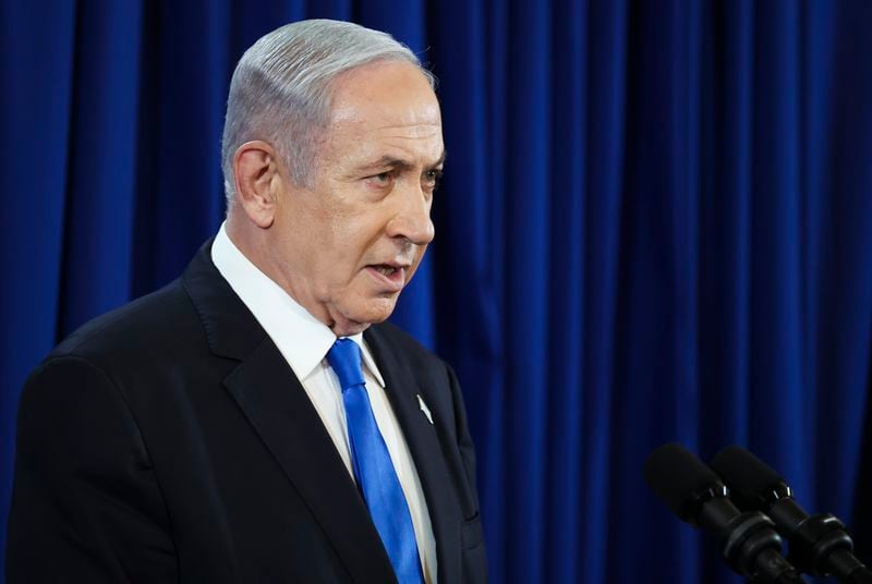 Israeli Prime Minister Benjamin Netanyahu speaks during a press conference in Tel Aviv, Israel, Saturday July 13, 2024. (Nir Elias/Pool Photo via AP)