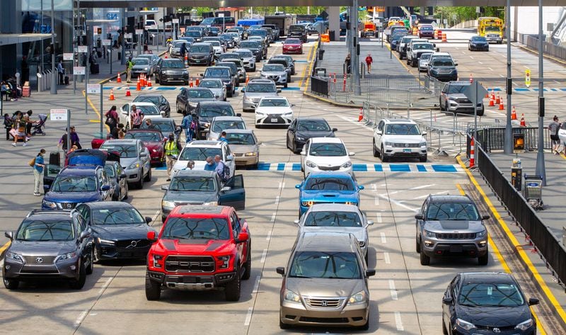 Cars pull up to the north terminal at Hartsfield-Jackson Atlanta International Airport Sunday, May 9, 2021.  STEVE SCHAEFER FOR THE ATLANTA JOURNAL-CONSTITUTION