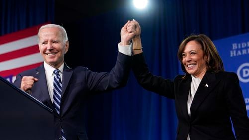 FILE - President Joe Biden and Vice President Kamala Harris stand on stage at the Democratic National Committee winter meeting, Feb. 3, 2023, in Philadelphia. (AP Photo/Patrick Semansky, File)