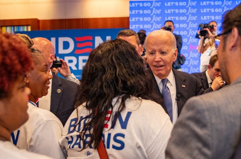 President Joe Biden drops in on a gathering for Democrats at the Hyatt Regency Atlanta on Thursday.
