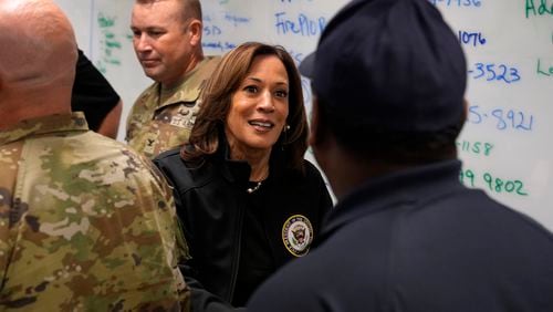 Democratic presidential nominee Vice President Kamala Harris greets people before a briefing at the Augusta Emergency Operations Center as she visits areas impacted by Hurricane Helene, in Augusta, Ga., Wednesday, Oct. 2, 2024. (AP Photo/Carolyn Kaster)