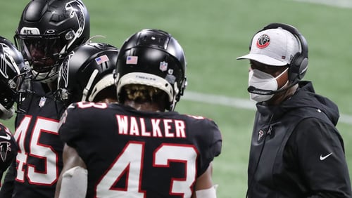 Falcons interim head coach Raheem Morris addresses the defense during a time out against the New Orleans Saints during the second quarter Sunday, Dec. 6, 2020, at Mercedes-Benz Stadium in Atlanta. (Curtis Compton / Curtis.Compton@ajc.com)