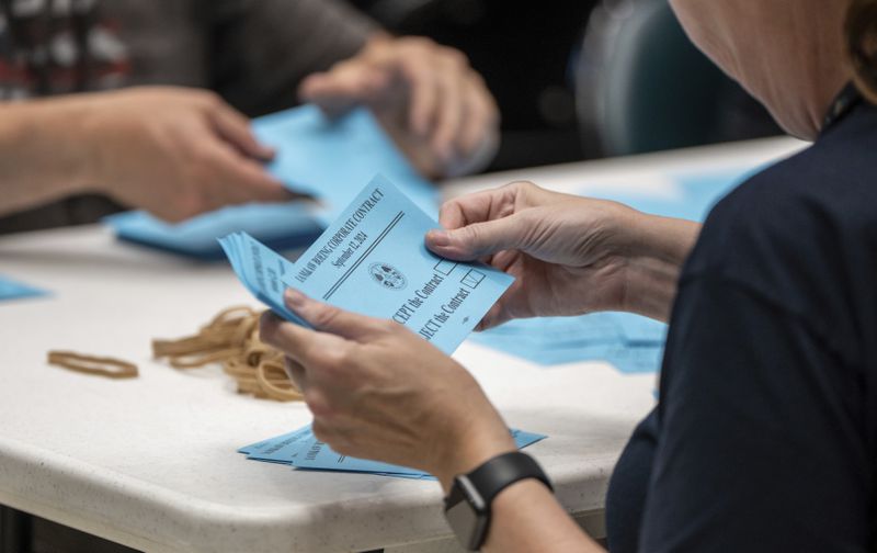 International Aerospace Machinists members count votes on a contract offer by airplane maker Boeing, on Thursday, Sept. 12, 2024, in Seattle. (AP Photo/Stephen Brashear)