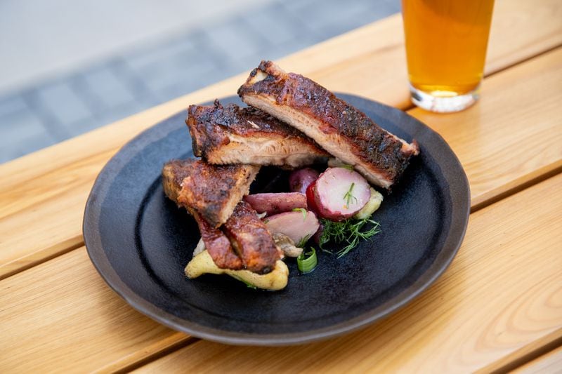 Biggerstaff Honey Butter Ribs with fingerling potatoes and mushroom salad. (Mia Yakel for The Atlanta Journal-Constitution)