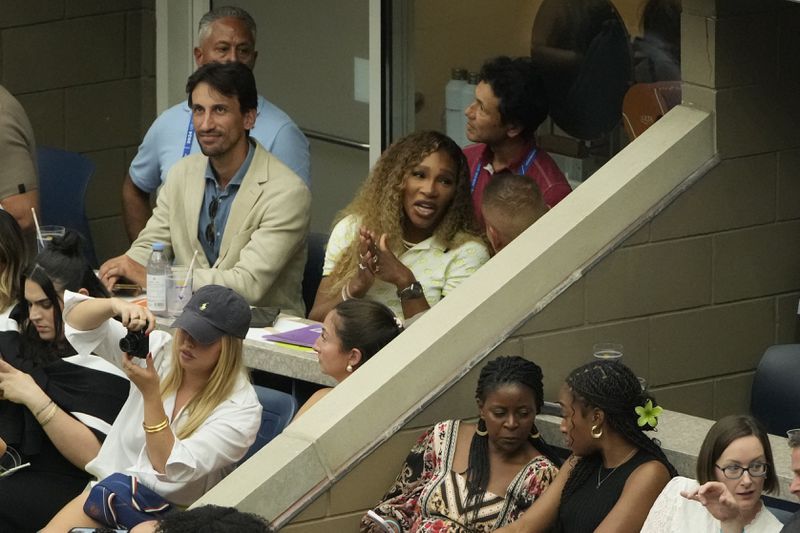 Serena Williams attendes a match between Grigor Dimitrov, of Bulgaria, and Andrey Rublev, of Russia, during the fourth round of the U.S. Open tennis championships, Sunday, Sept. 1, in New York. 2024. (AP Photo/Pamela Smith)