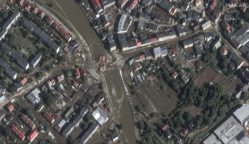 This satellite image released by Maxar Technologies shows floodwaters and debris after record rains in Glucholazy, Poland, Tuesday, Sept. 17, 2024. (Satellite image ©2024 Maxar Technologies via AP)