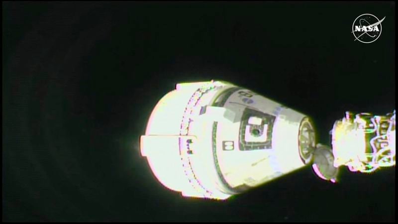 In this image from video provided by NASA, the unmanned Boeing Starliner capsule undocks as it pulls away from the International Space Station on Friday, Sept. 6, 2024. (NASA via AP)