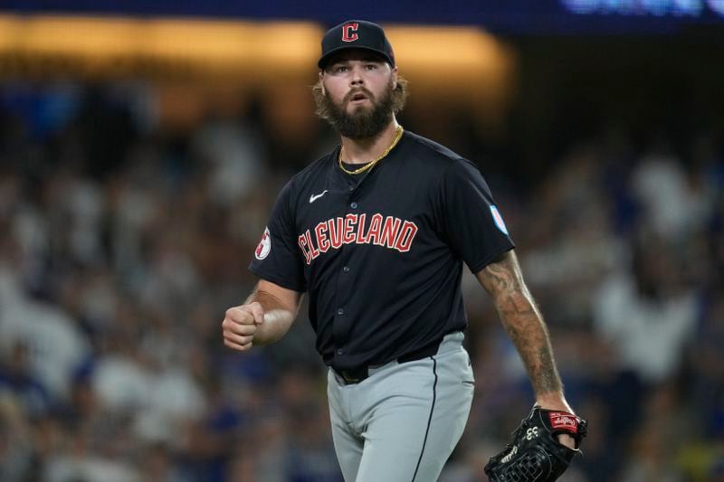 Cleveland Guardians relief pitcher Hunter Gaddis celebrates after the eighth inning of a baseball game against the Los Angeles Dodgers in Los Angeles, Friday, Sept. 6, 2024. (AP Photo/Ashley Landis)