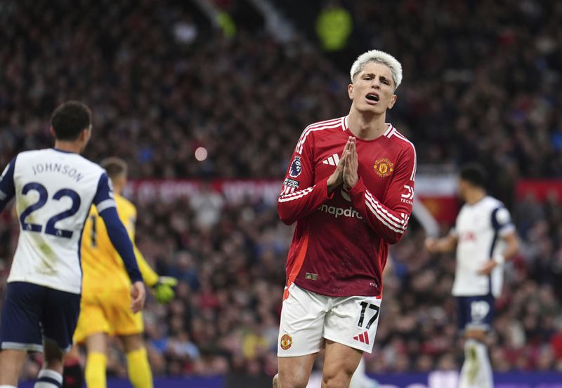 Manchester United's Alejandro Garnacho reacts during the English Premier League soccer match between Manchester United and Tottenham Hotspur at Old Trafford stadium in Manchester, England, Sunday, Sept. 29, 2024. (Martin Rickett/PA via AP)