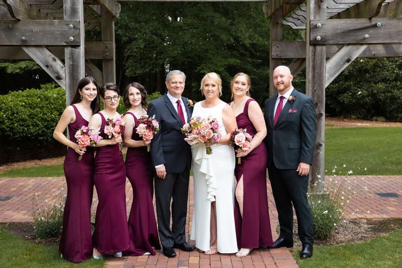 From left: Rob Stadler's daughters Ashley, Caroline and Audrey; Rob, his wife, Angie, her daughter, Jenna, and son, Jeremy.