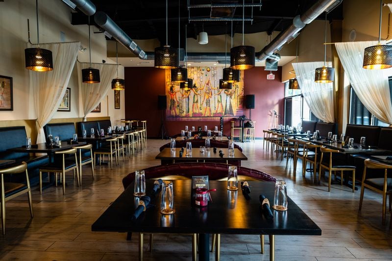 Sam Abdelaziz, owner of Pharaohs Palace in Alpharetta, says he chose the black-gold-red color palette as a nod to Egyptian royalty. CONTRIBUTED BY HENRI HOLLIS