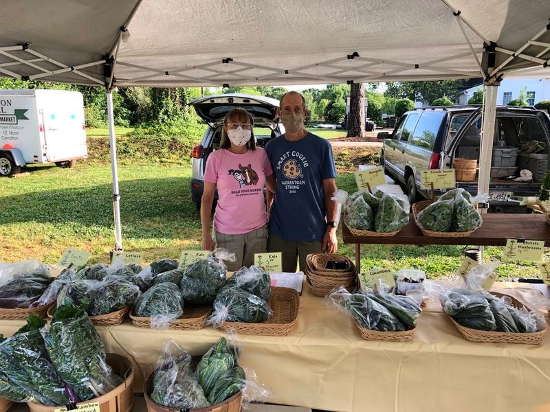 Cotton Mill Farmers Market requires masks for vendors like Wendy Crager and Bryan Hager of Crager Hager Farm and produce is packaged for no touch sales.
Courtesy of Wendy Crager