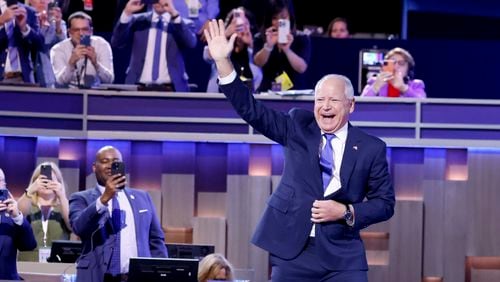 Minnesota Gov. Tim Walz, Vice President Kamala Harris’ running mate, speaks on the third day of the Democratic National Convention in Chicago on Wednesday, Aug. 21, 2024. (Arvin Temkar / AJC)