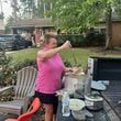 Janice Barrett ladles up soup and gives it to neighbors on Monday, September 30, 2024.  (Photo Courtesy of Charmain Z. Brackett/Augusta Good News)