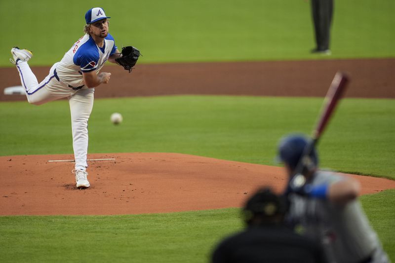 Atlanta Braves pitcher Spencer Schwellenbach (56) delivers to Toronto Blue Jays' Daulton Varsho (25) in the first innjing of a baseball game, Saturday, Sept. 7, 2024, in Atlanta.(AP Photo/Mike Stewart)