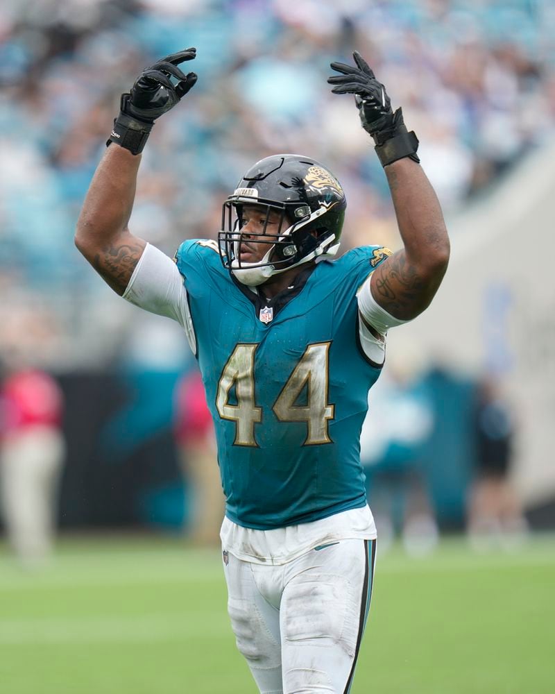 Jacksonville Jaguars' Travon Walker reacts during the second half of an NFL football game against the Indianapolis Colts, Sunday, Oct. 6, 2024, in Jacksonville, Fla. (AP Photo/John Raoux)