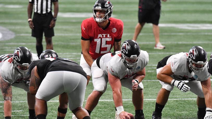 Atlanta Falcons quarterback Feleipe Franks (15) looks up from the