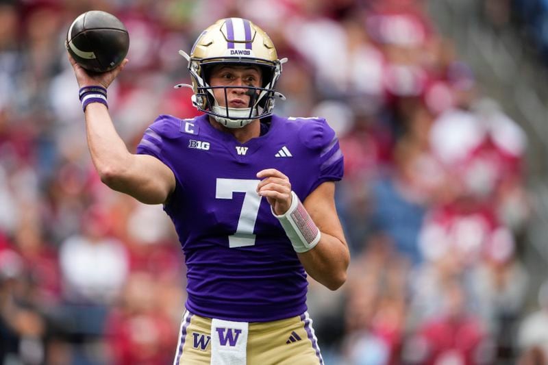 Washington quarterback Will Rogers (7) throws against Washington State during the first half of an NCAA college football game Saturday, Sept. 14, 2024, in Seattle. (AP Photo/Lindsey Wasson)