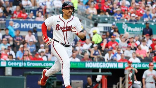 Nacho Alvarez Jr. runs to first during a groundout in his first major-league at-bat Monday as the Braves hosted the Reds at Truist Park.