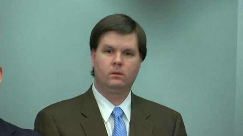 Justin Ross Harris stands as the jury enters the room right before the verdict was read in Harris' murder trial at the Glynn County Courthouse in Brunswick, Ga., on Monday, Nov. 14, 2016. Harris was found guilty on all eight counts. (screen capture via WSB-TV)