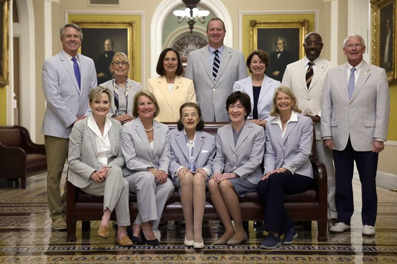U.S. Sen. Raphael Warnock (back row, second from right), D-Ga., was among the members of Congress who participated in seersucker day at the Capitol in 2023. 