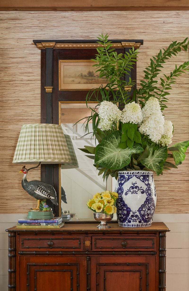 Interior designer James Farmer thinks a key element of Southern style is mixing high and low as in this arrangement of humble sunflowers in a fancy silver cup.
(Courtesy of Emily Followill)