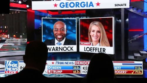 Republican supporters watch returns for Democratic U.S. Senate candidate Raphael Warnock and Republican incumbent Kelly Loeffler come in at the Georgia Republican Party Election Night Celebration Party at the Intercontinental Buckhead Atlanta hotel on Tuesday, Nov. 3, 2020, in Atlanta. The two candidates are now in a Jan. 5 runoff. (Curtis Compton / Curtis.Compton@ajc.com)